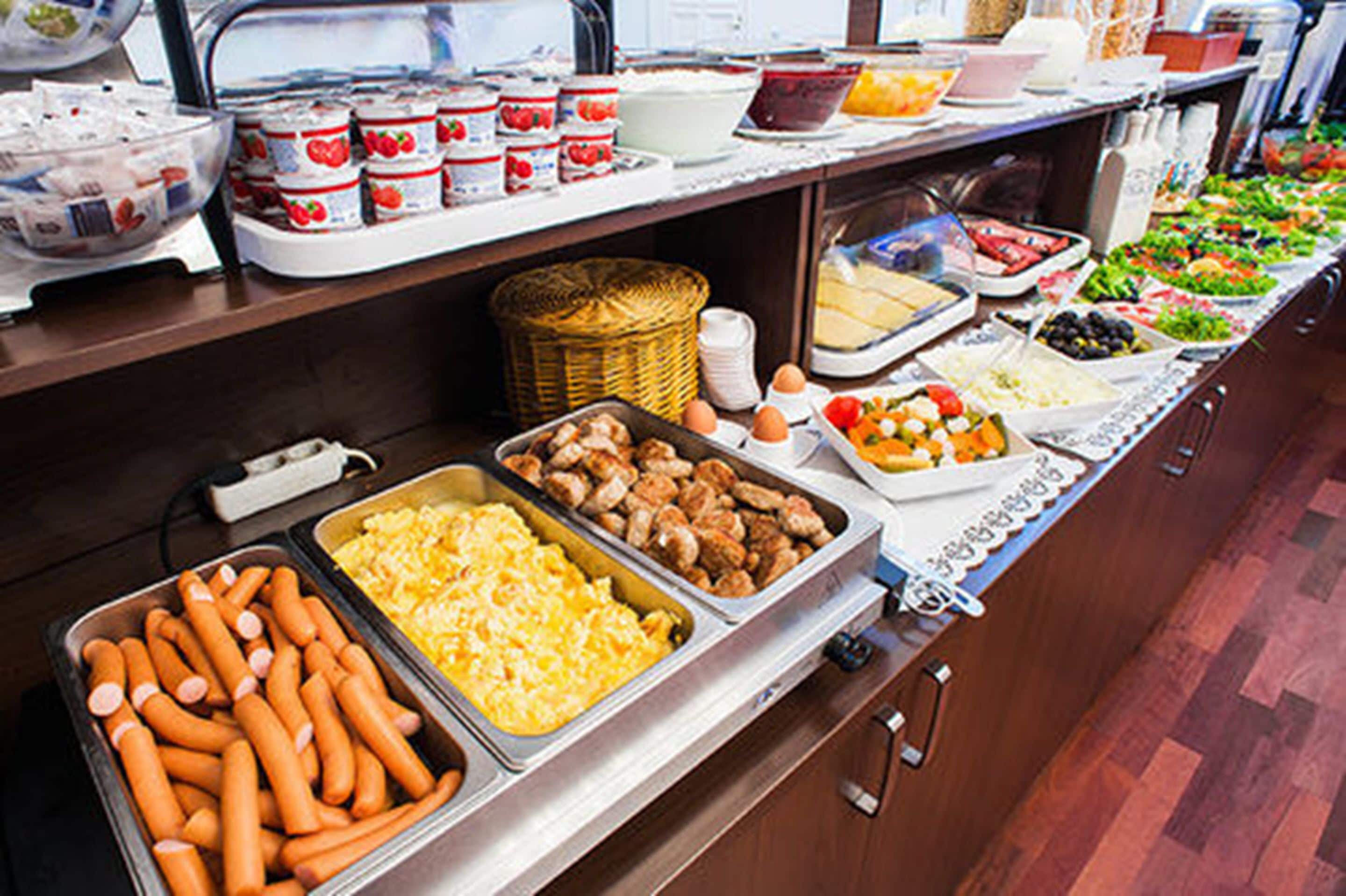Daily buffet breakfast (EUR 14 per person)