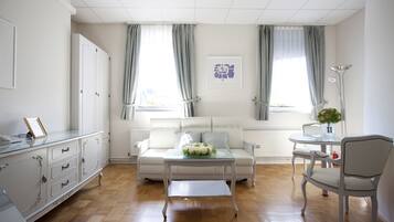 Apartment for 2 people | Living room | 80-cm LCD TV with cable channels, TV