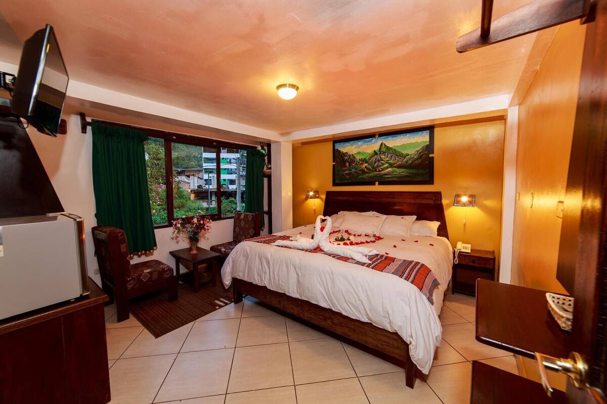 Hypo-allergenic bedding, down duvets, pillow-top beds, in-room safe