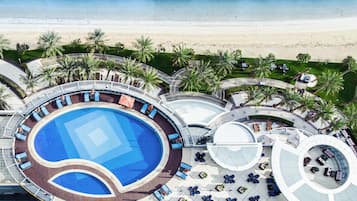 Outdoor pool, pool umbrellas, sun loungers