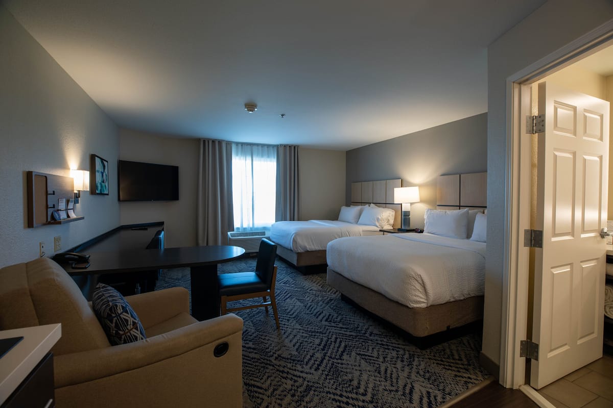 Premium bedding, down comforters, pillowtop beds, desk