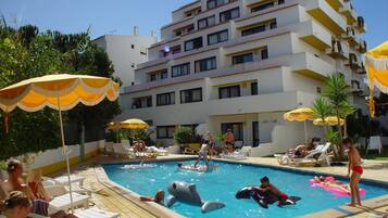 Seasonal outdoor pool, open 9:00 AM to 7:00 PM, sun loungers