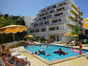 Seasonal outdoor pool, open 9:00 AM to 7:00 PM, pool loungers