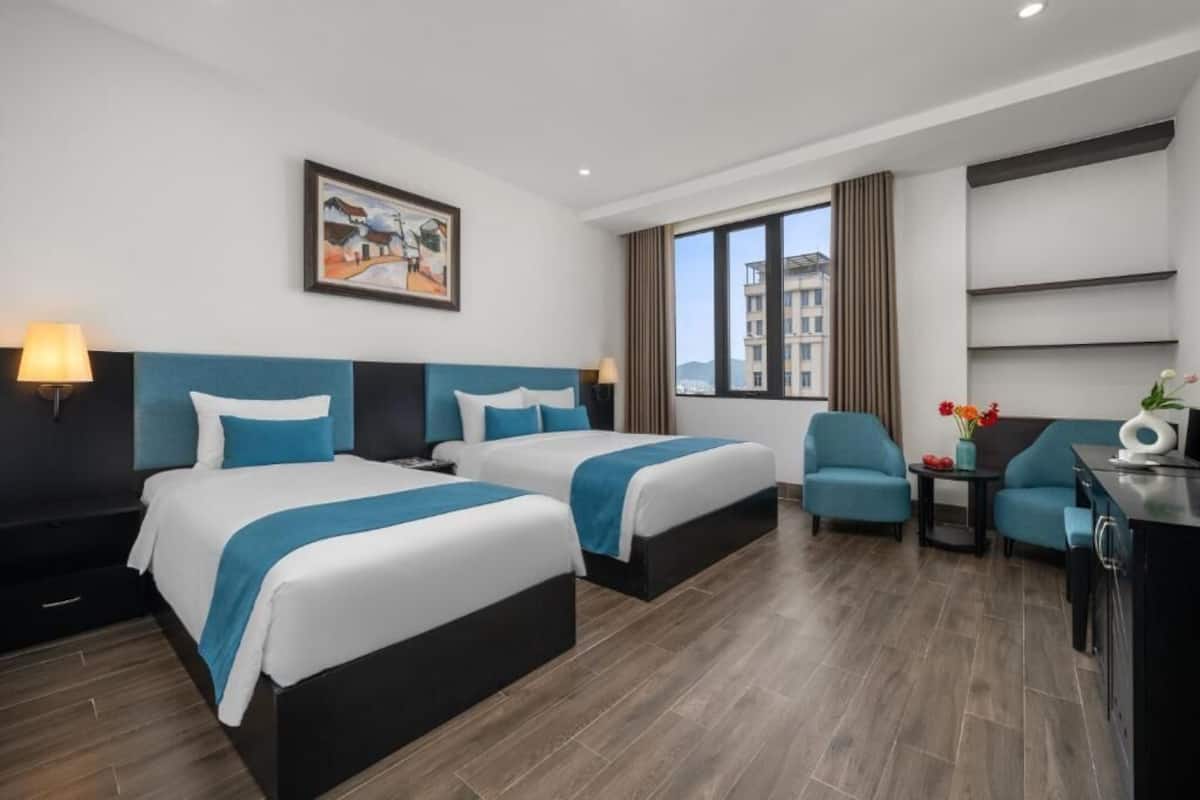 Deluxe Triple Room, City View | Minibar, in-room safe, desk, WiFi (free)