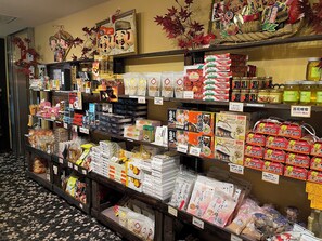 A variety of packaged goods on shelves in a store. - Hotel Garden Palace & Kansai Airport Spa (Izumisano)