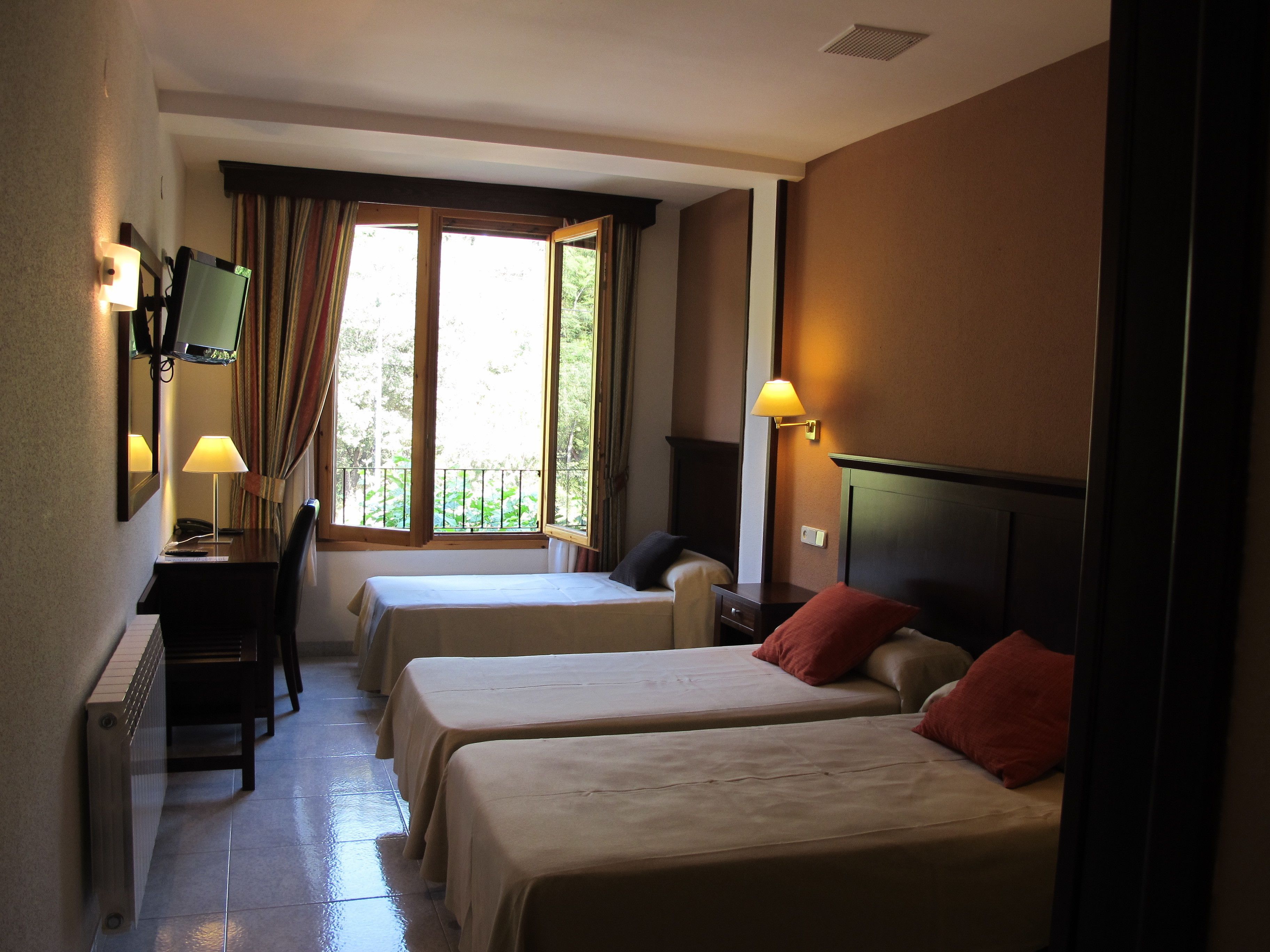 triple room for 3 adults | individually furnished, desk, iron/ironing board, cots/infant beds