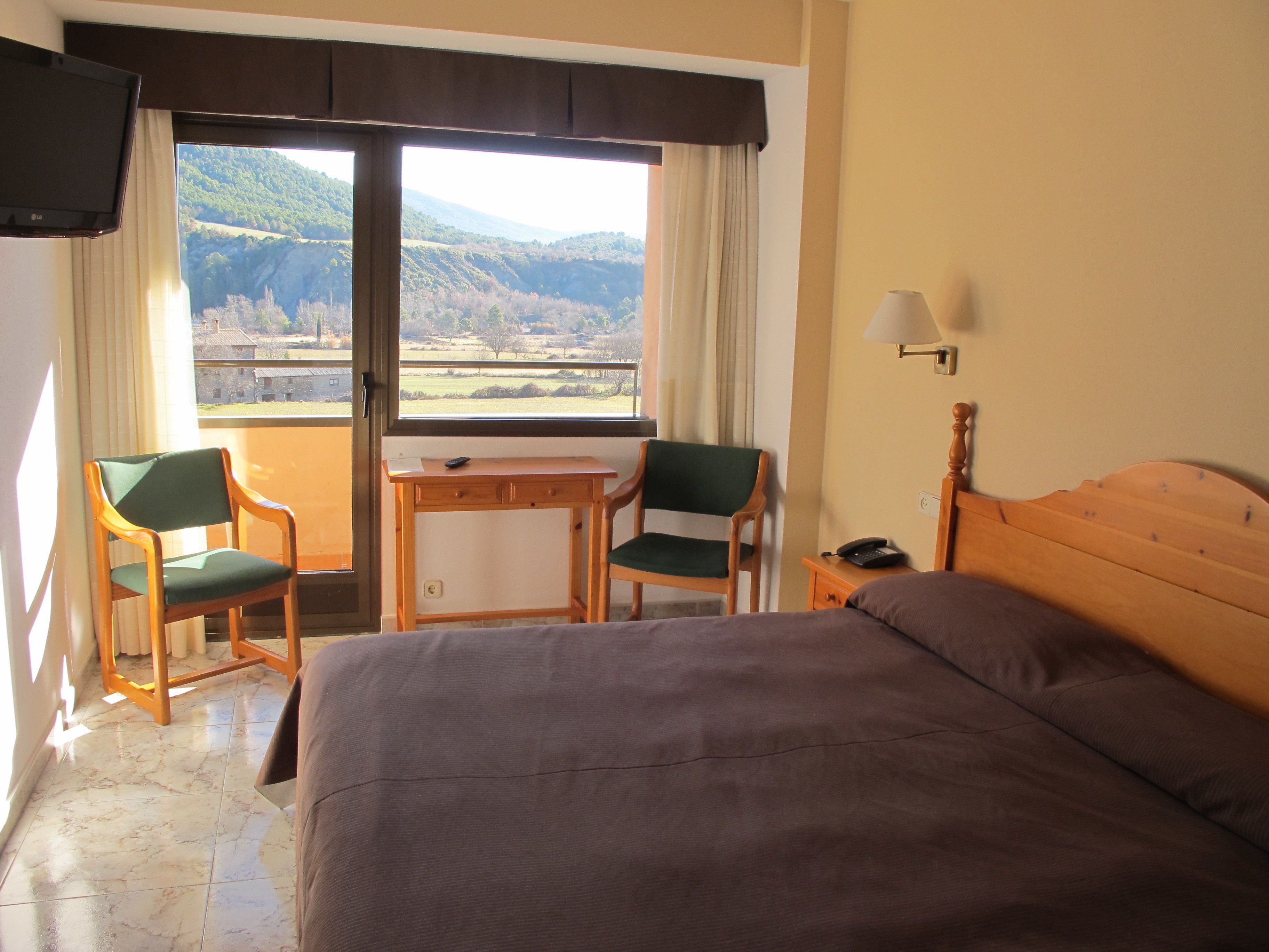 double room, mountain view (1 bed) | individually furnished, desk, iron/ironing board, cots/infant beds