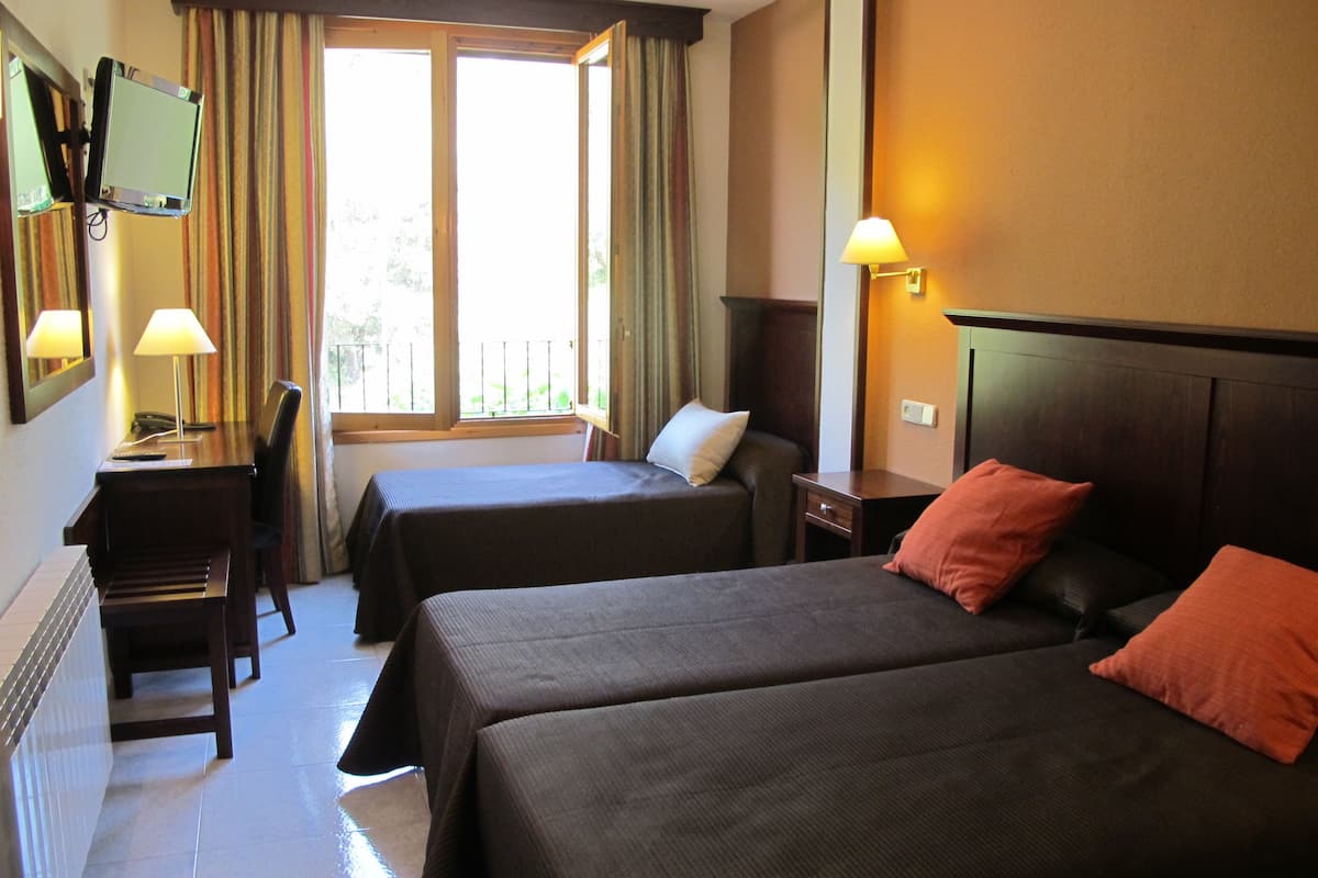 triple room for 3 adults | individually furnished, desk, iron/ironing board, cots/infant beds