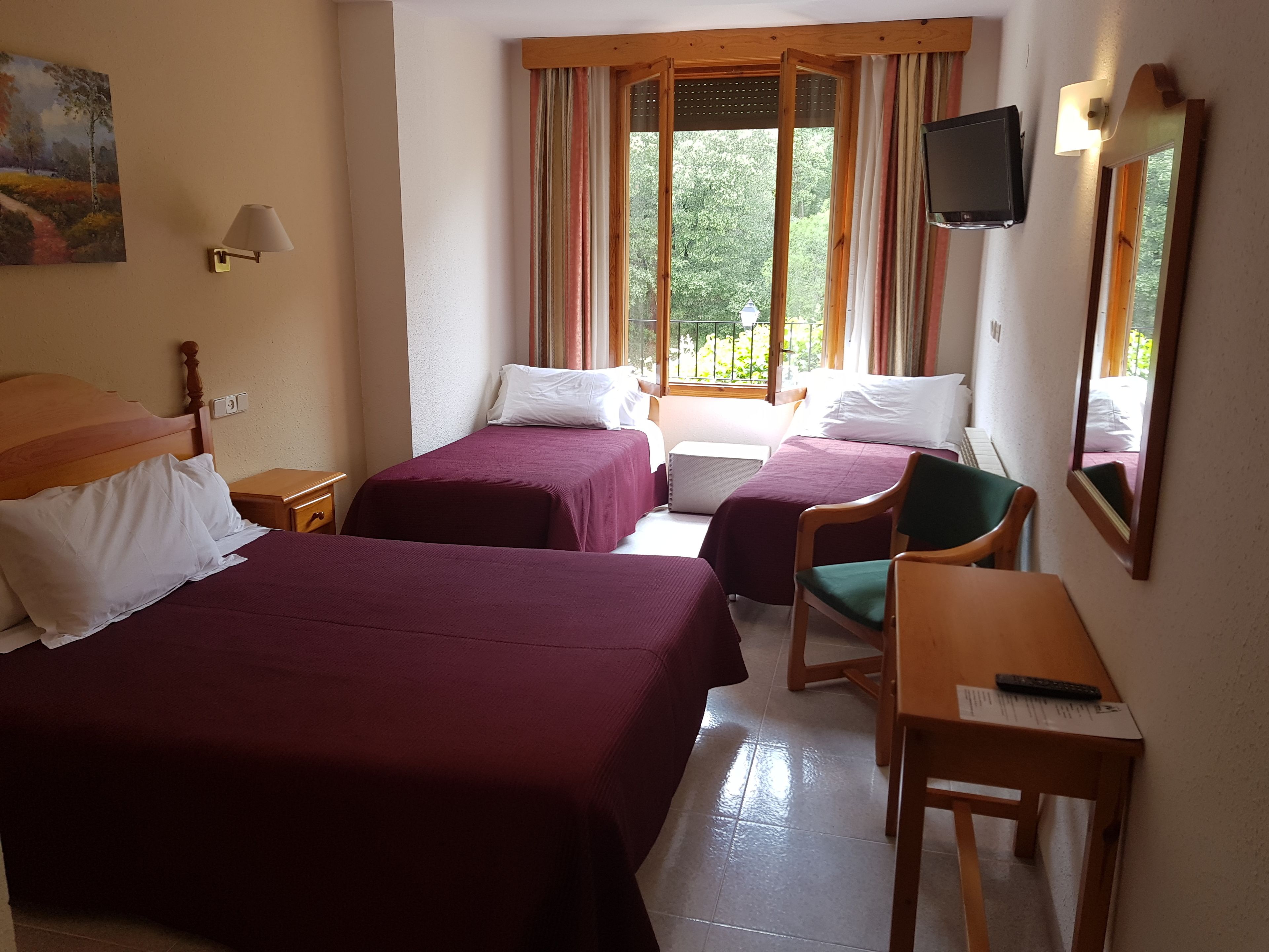 family room | individually furnished, desk, iron/ironing board, cots/infant beds