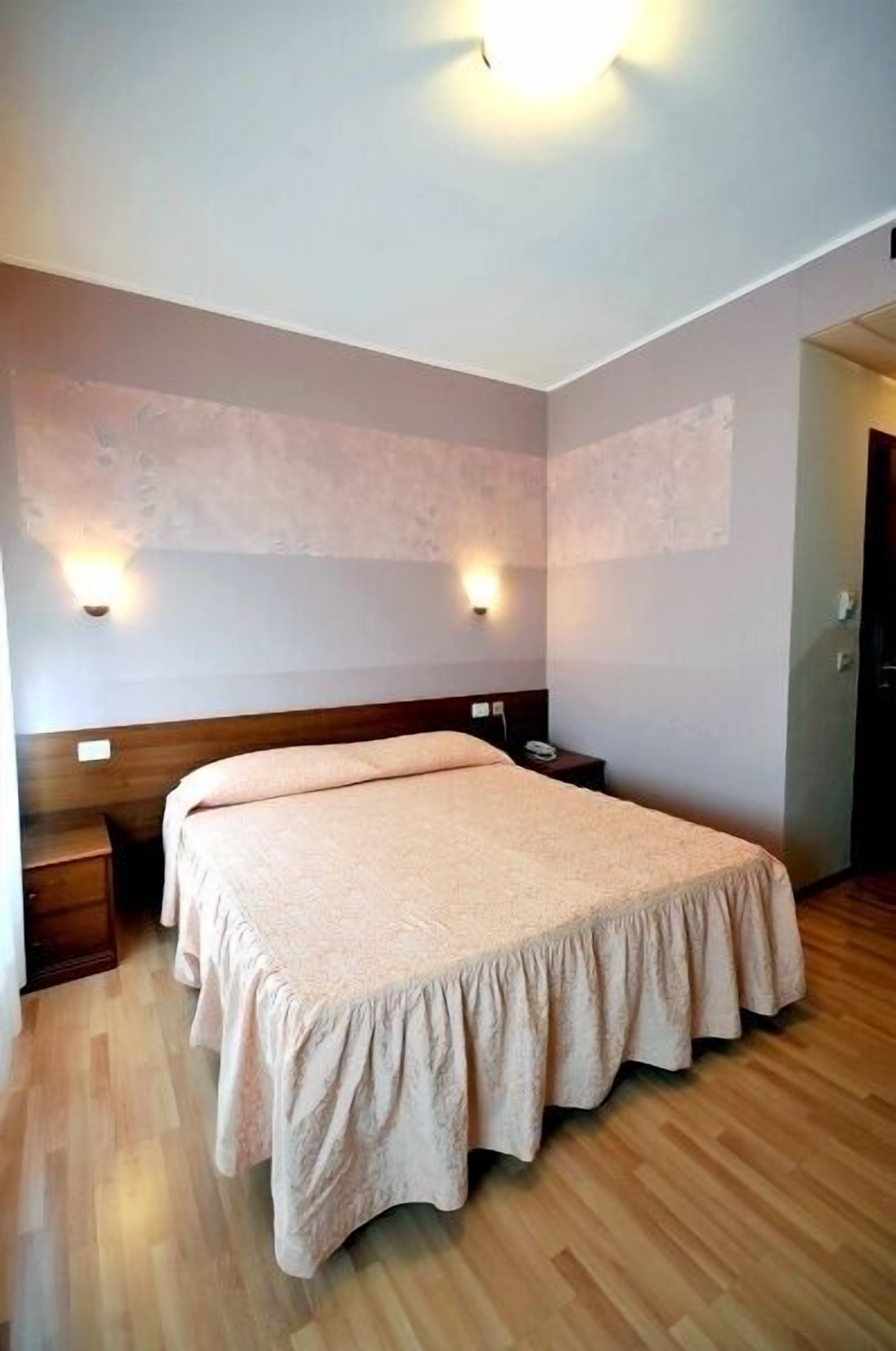 double or twin room | minibar, in-room safe, individually decorated, desk