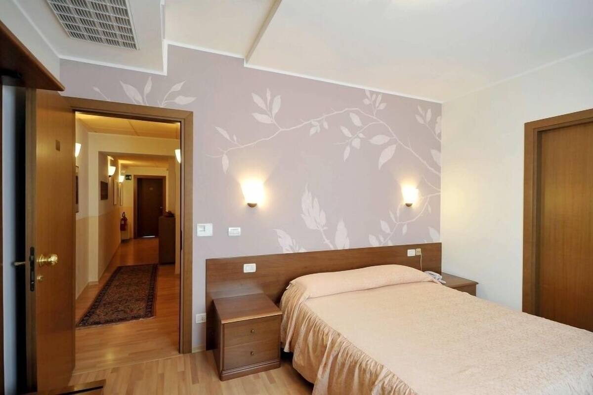 double or twin room | minibar, in-room safe, individually decorated, desk