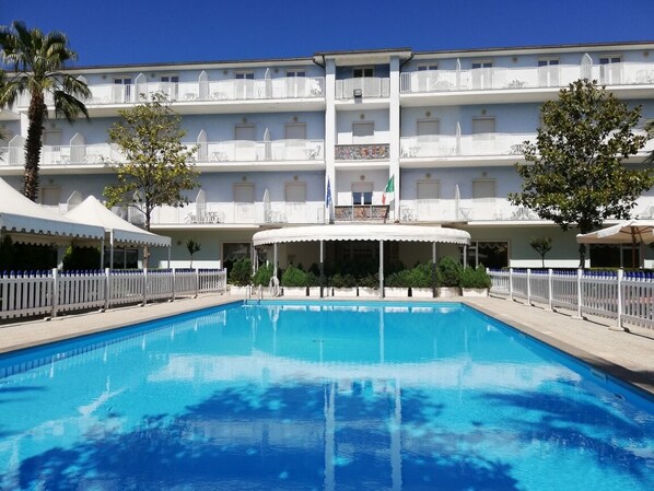 Outdoor pool, pool umbrellas, pool loungers