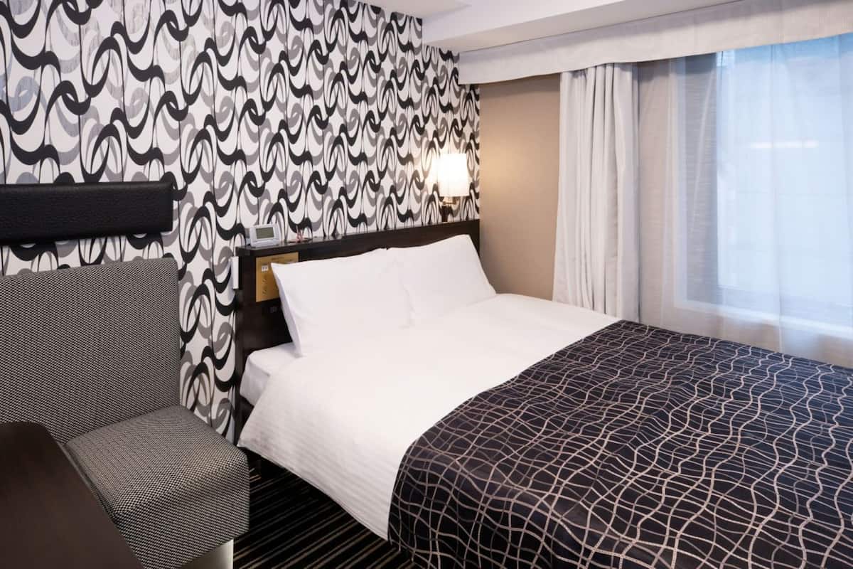 Deluxe Double Room, Non Smoking | Down comforters, desk, blackout drapes, iron/ironing board