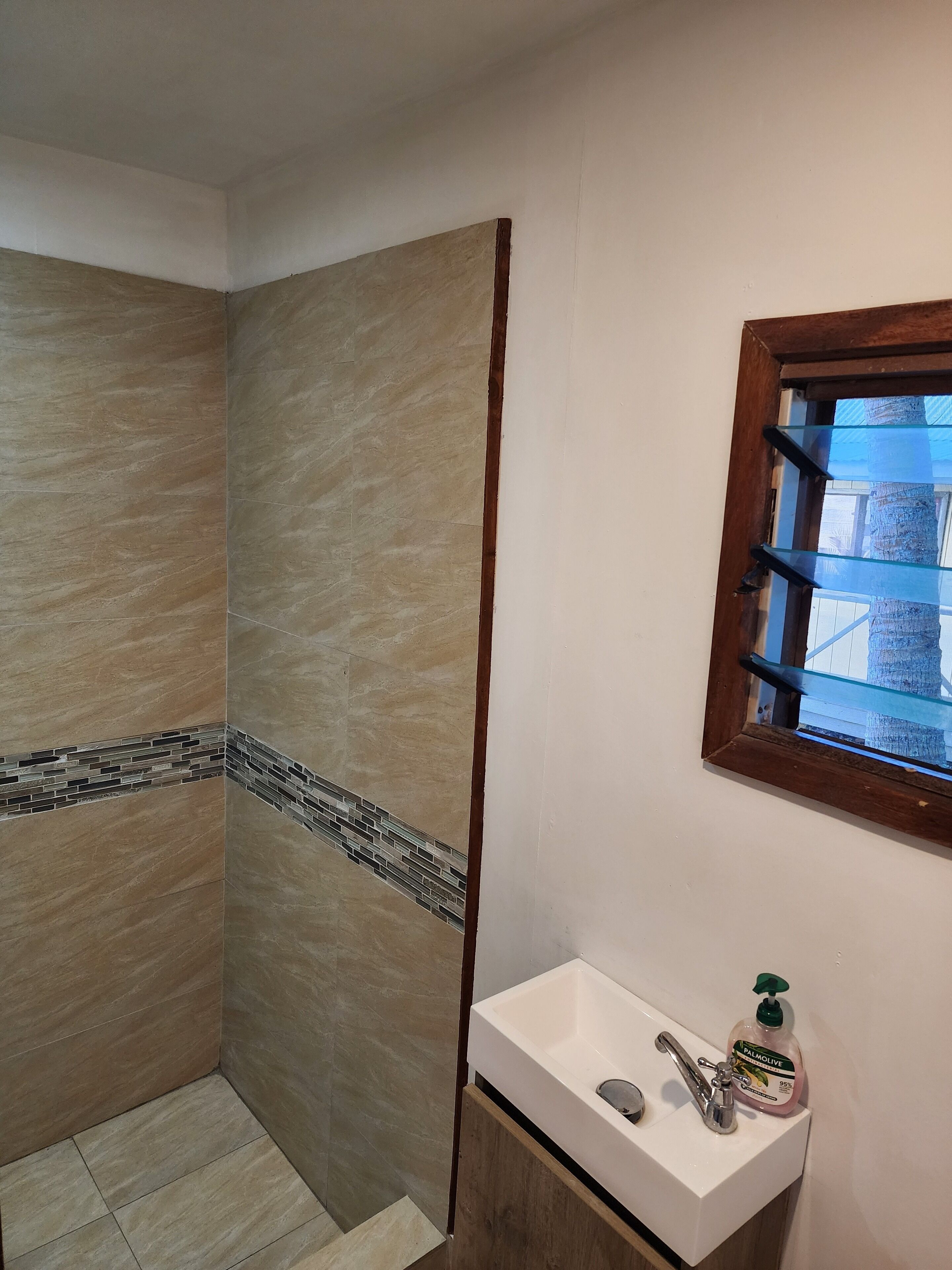 deluxe quadruple room, 1 bedroom, ocean view, oceanfront (fale) | bathroom | shower, hair dryer, bathrobes, towels