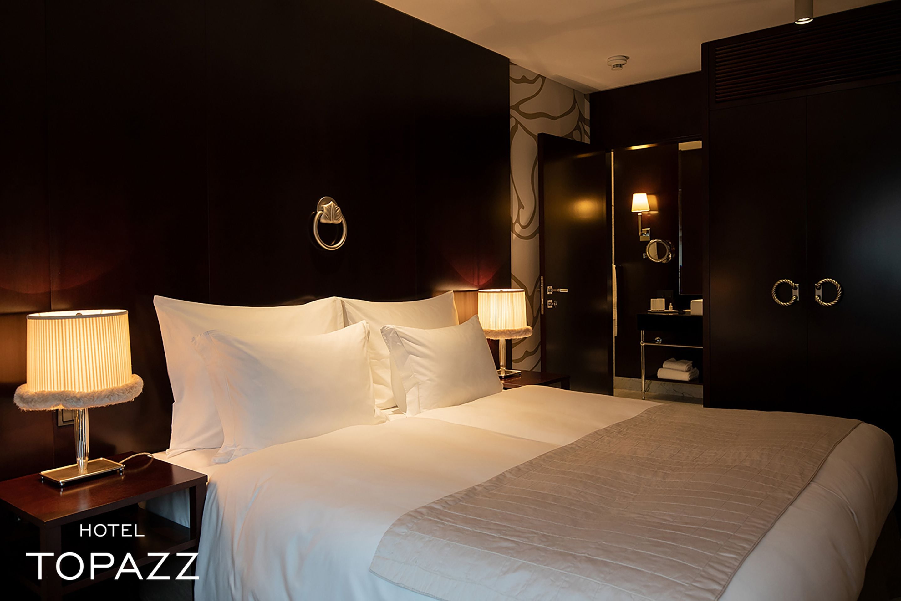 deluxe room at topazz | premium bedding, down duvets, pillow-top beds, in-room safe
