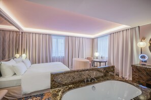 Premium bedding, down duvets, pillow-top beds, in-room safe