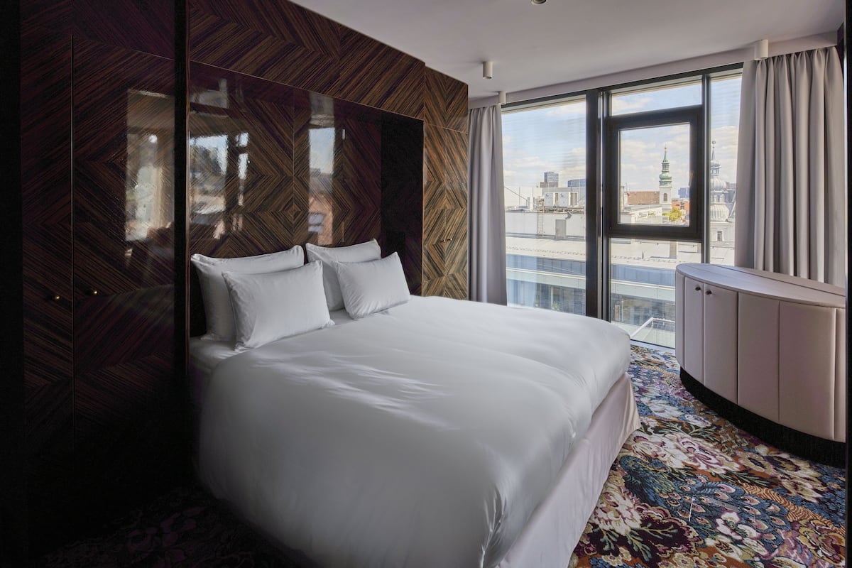 Premium bedding, down duvets, pillow-top beds, in-room safe
