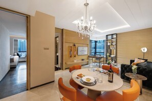 Business Suite | Living area | LCD TV, MP3 dock - Kempinski The One Suites Hotel Shanghai Downtown (Shanghai)