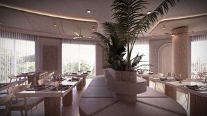 A modern dining area with long tables, chairs, and a central potted plant. - Bodrum Beach Resort (Bodrum)