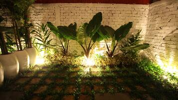 Habitación individual superior, 1 cama individual, en el área del jardín | Terraza o patio