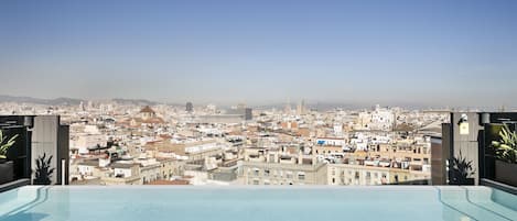 Outdoor pool, open 9:00 AM to 9:00 PM, sun loungers