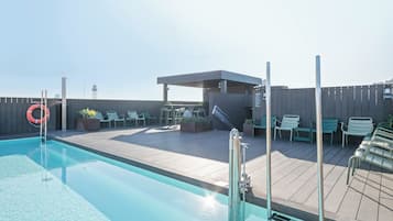 Outdoor pool, open 9:00 AM to 9:00 PM, sun loungers