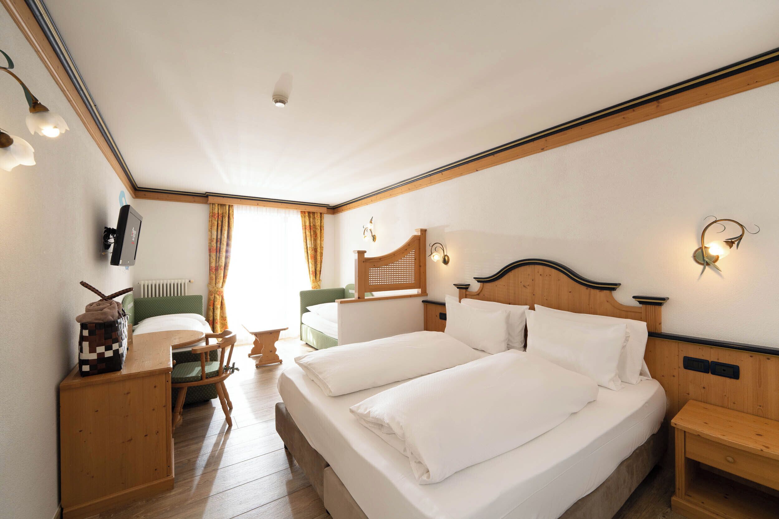 Family Quadruple Room | Down comforters, pillowtop beds, in-room safe, laptop workspace