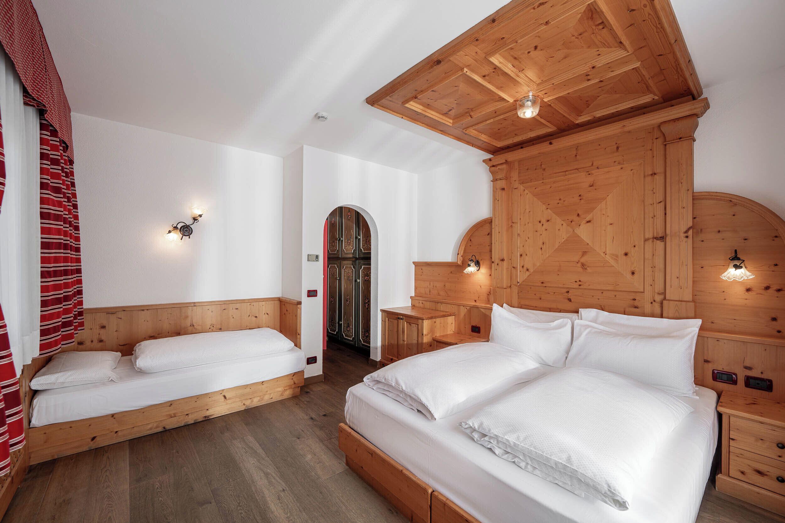 Family Triple Room | Down comforters, pillowtop beds, in-room safe, laptop workspace