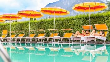 Outdoor pool, open 9:00 AM to 6:30 PM, pool umbrellas, pool loungers