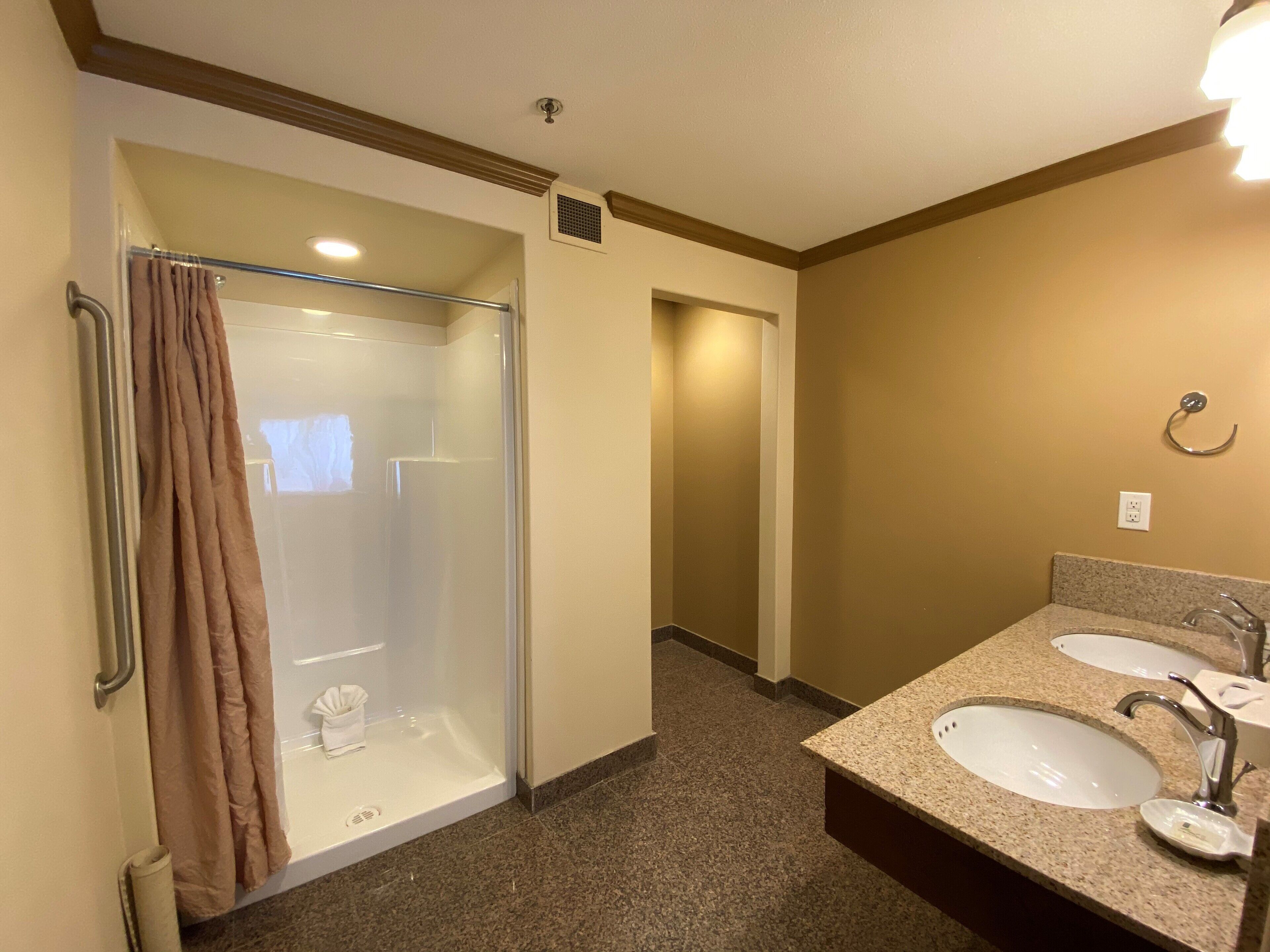 family suite, multiple beds, non smoking | bathroom | hair dryer, towels