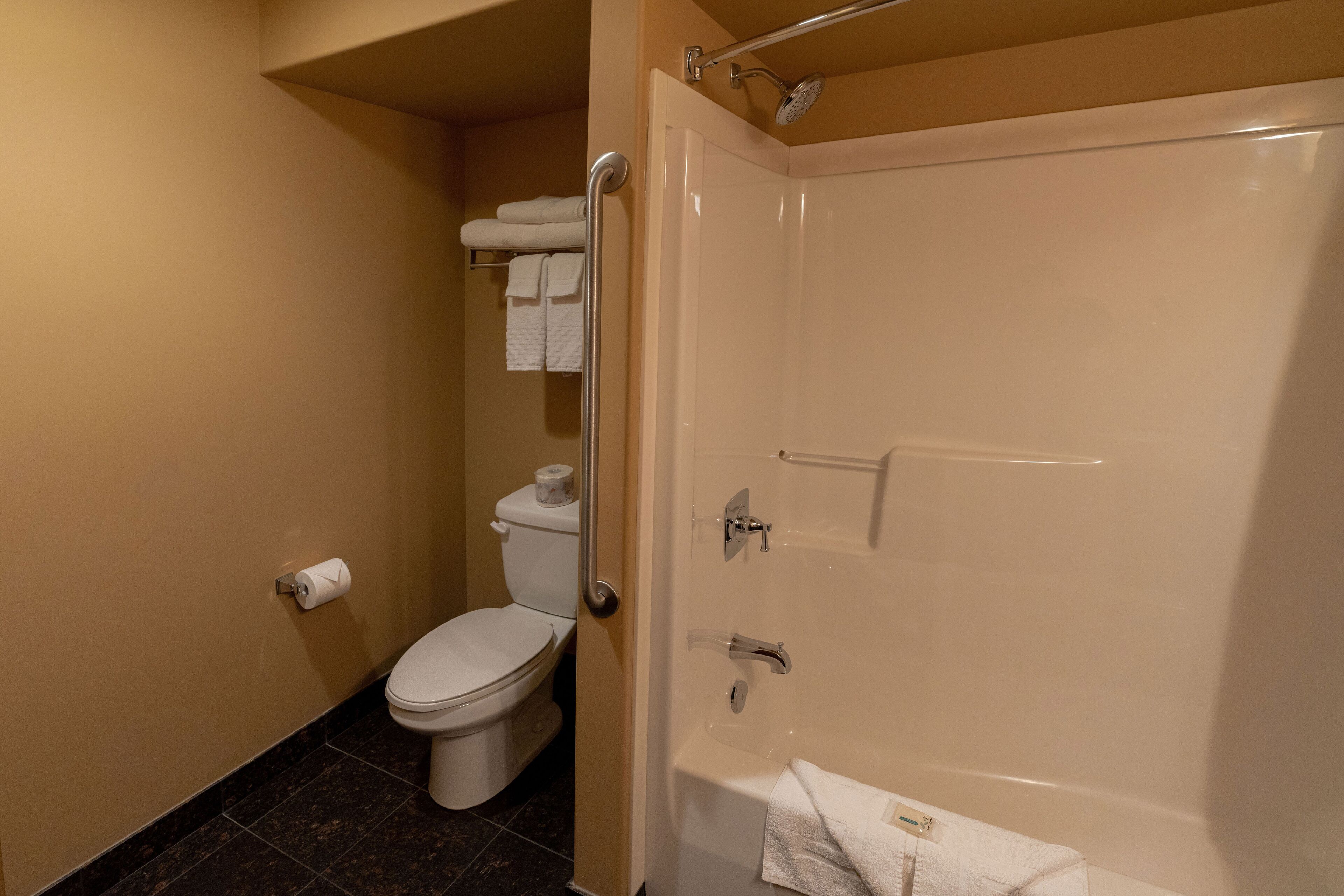 family suite, multiple beds, non smoking | bathroom | hair dryer, towels