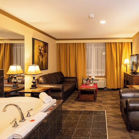 Suite, 1 King Bed, Non Smoking, Jetted Tub, Refrigerator & Microwave - Pets Not Allowed | Living area | 42-inch TV with digital channels. Camrose Resort & Casino