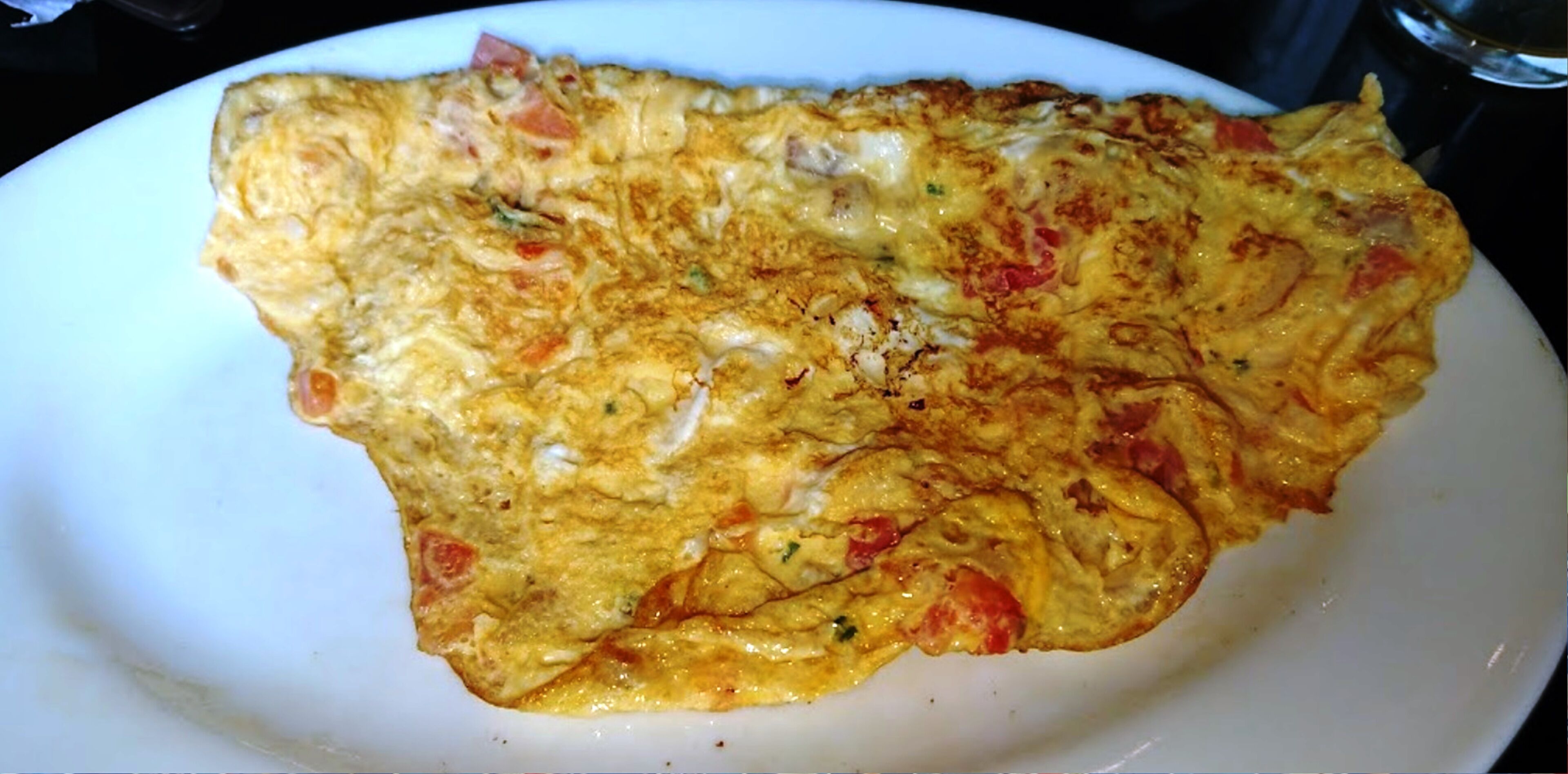 A plate with an omelette.