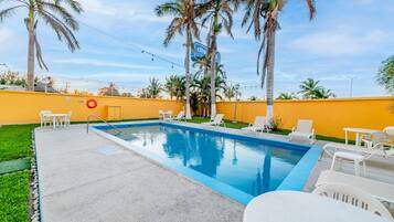 Outdoor pool, open 9:00 AM to 8:00 PM, sun loungers