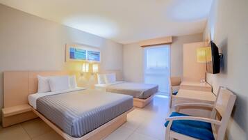 Down comforters, desk, blackout drapes, iron/ironing board