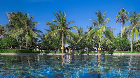 Outdoor pool, open 8:00 AM to 10:30 PM, free cabanas, pool umbrellas