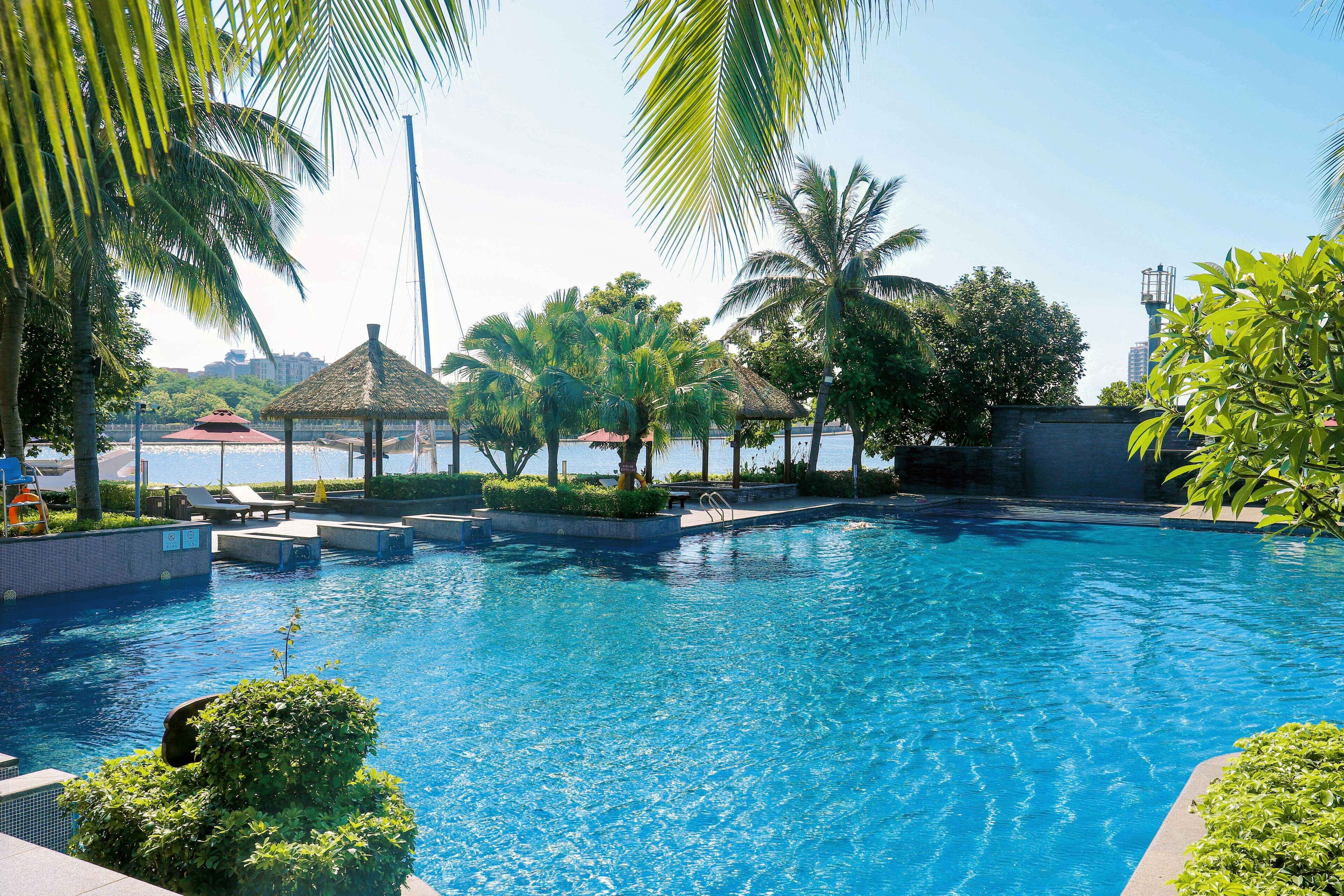 Outdoor pool, open 8:00 AM to 10:30 PM, free pool cabanas