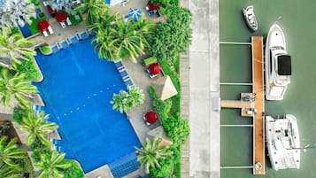 Outdoor pool, open 8:00 AM to 10:30 PM, free pool cabanas