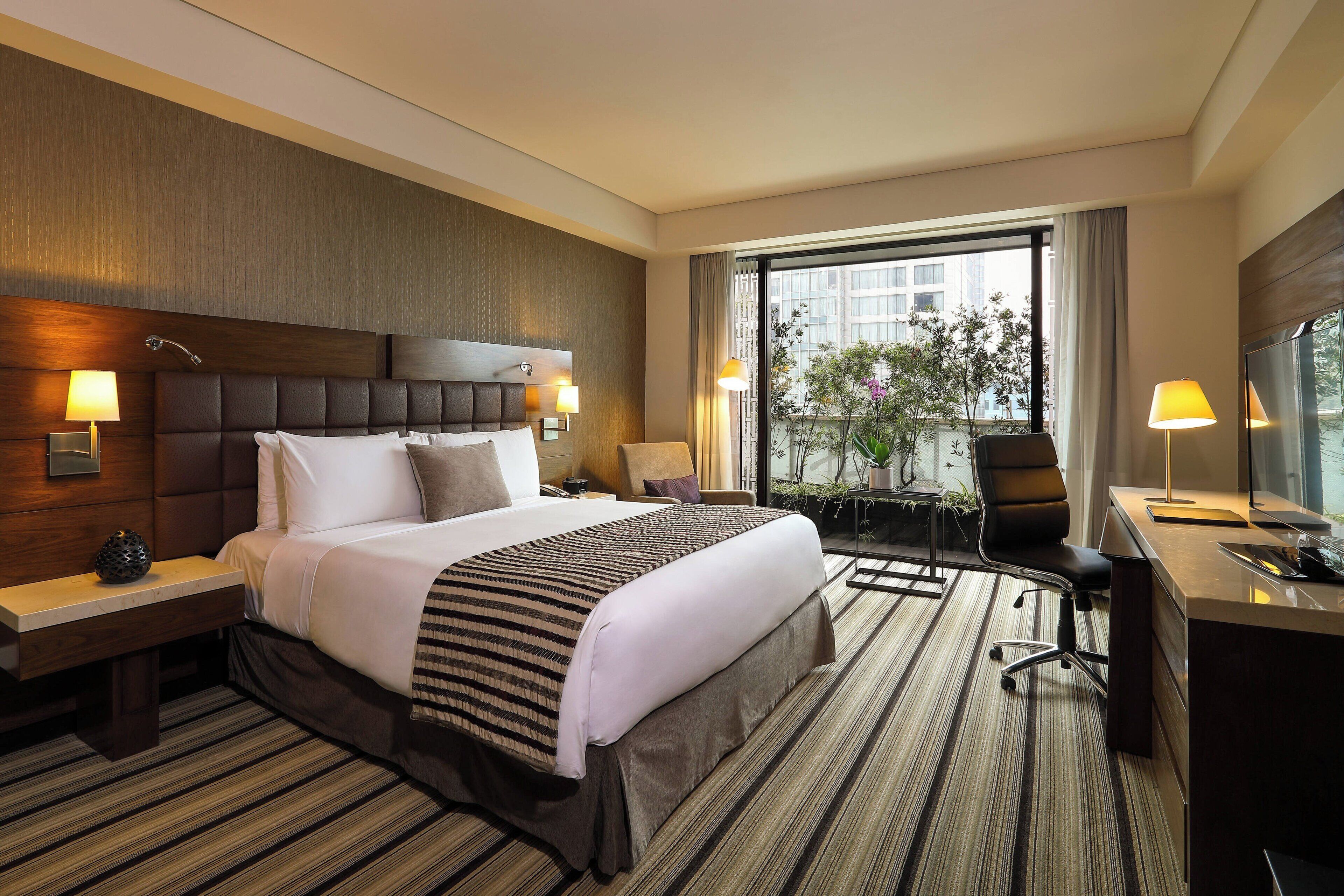 Habitación Deluxe, 1 cama King size, vista a la ciudad | Sábanas de algodón egipcio, ropa de cama de alta calidad y edredón 