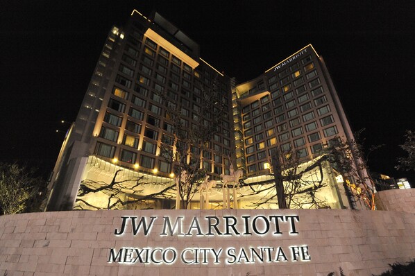 JW Marriott Mexico City Santa Fe building at night with illuminated signage. - JW Marriott Hotel Mexico City Santa Fe (Mexico City)