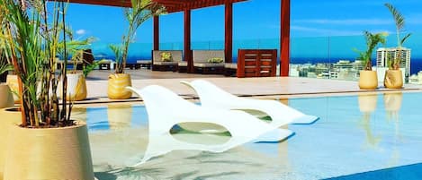 Outdoor pool, sun loungers
