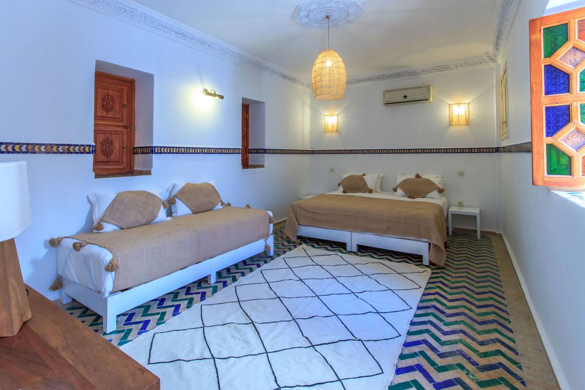 Premium bedding, laptop workspace, iron/ironing board (on request)