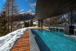 Indoor pool, outdoor pool, pool umbrellas, sun loungers