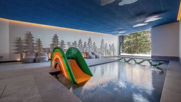 Indoor pool, outdoor pool, pool umbrellas, sun loungers