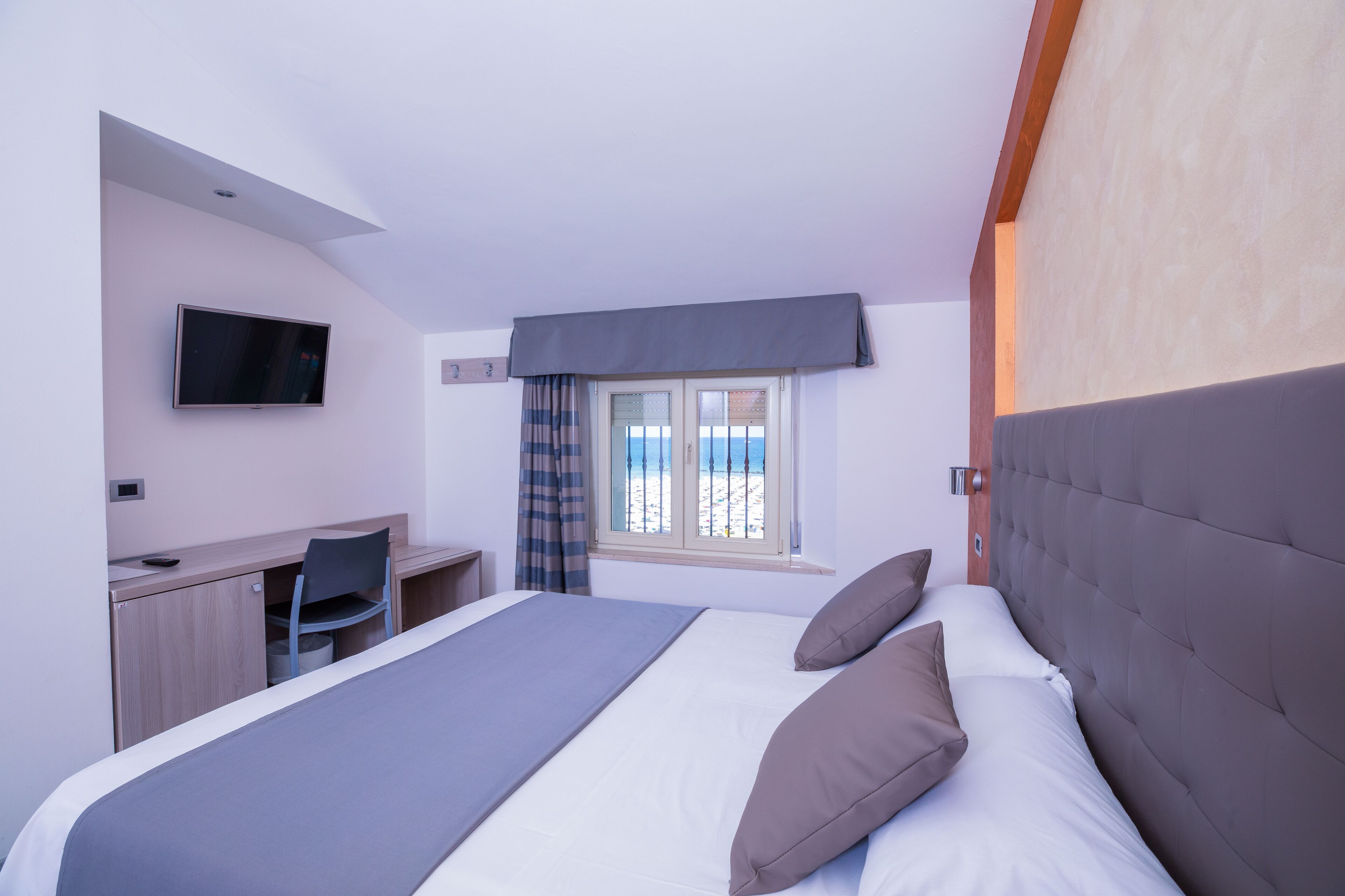 premium bedding, down duvets, minibar, in-room safe