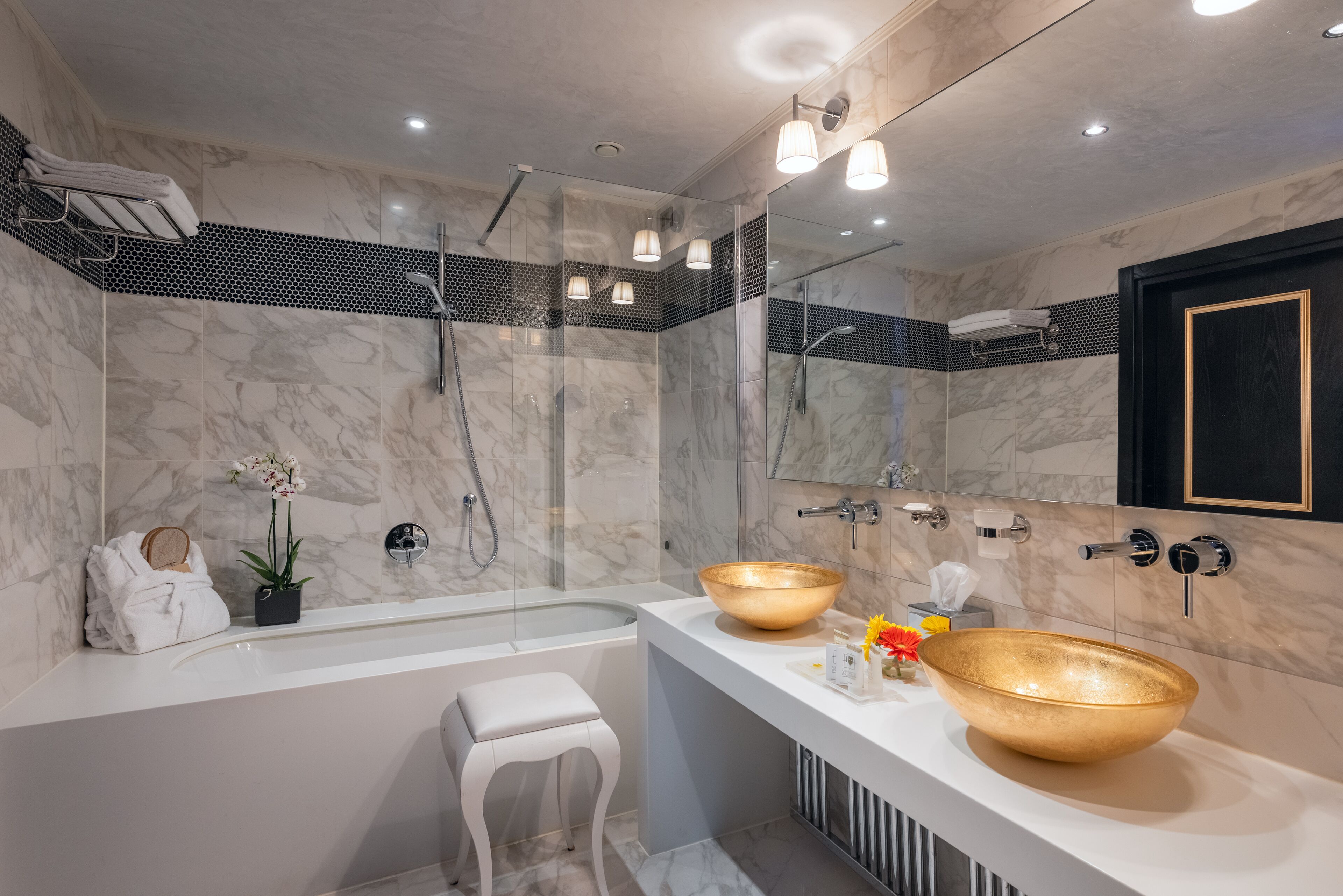 suite, canal view | bathroom | rainfall showerhead, hair dryer, slippers, bidet