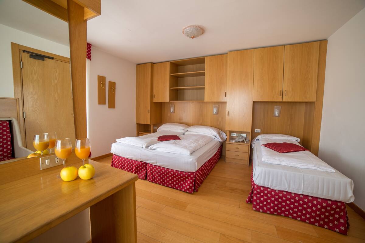 Quadruple Room | Egyptian cotton sheets, down comforters, Select Comfort beds
