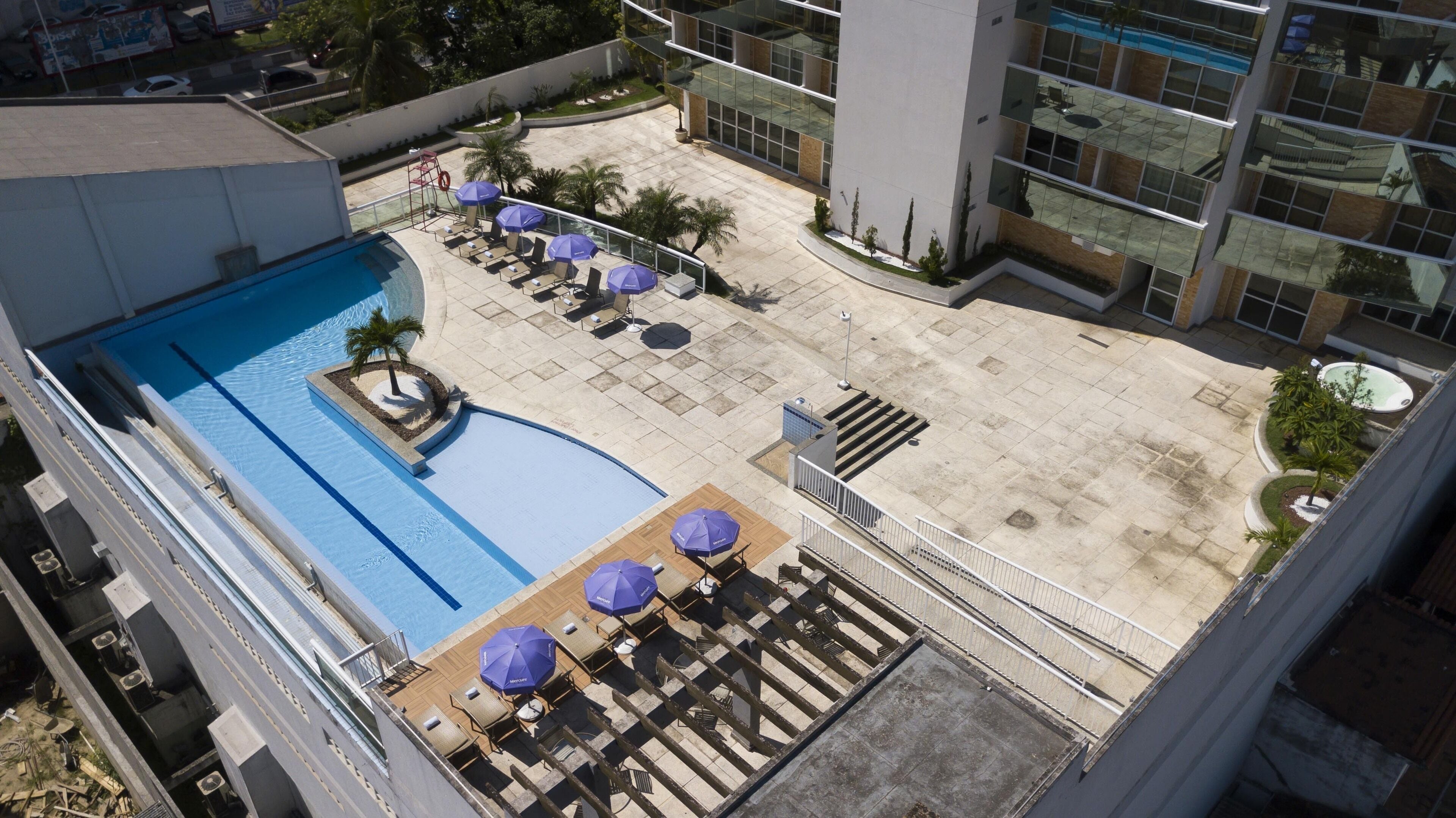 outdoor pool, open 10:00 am to 6:00 pm, pool umbrellas, pool loungers