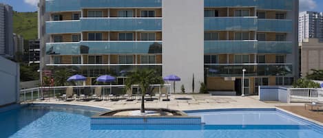 Outdoor pool, open 10:00 AM to 6:00 PM, pool umbrellas, pool loungers