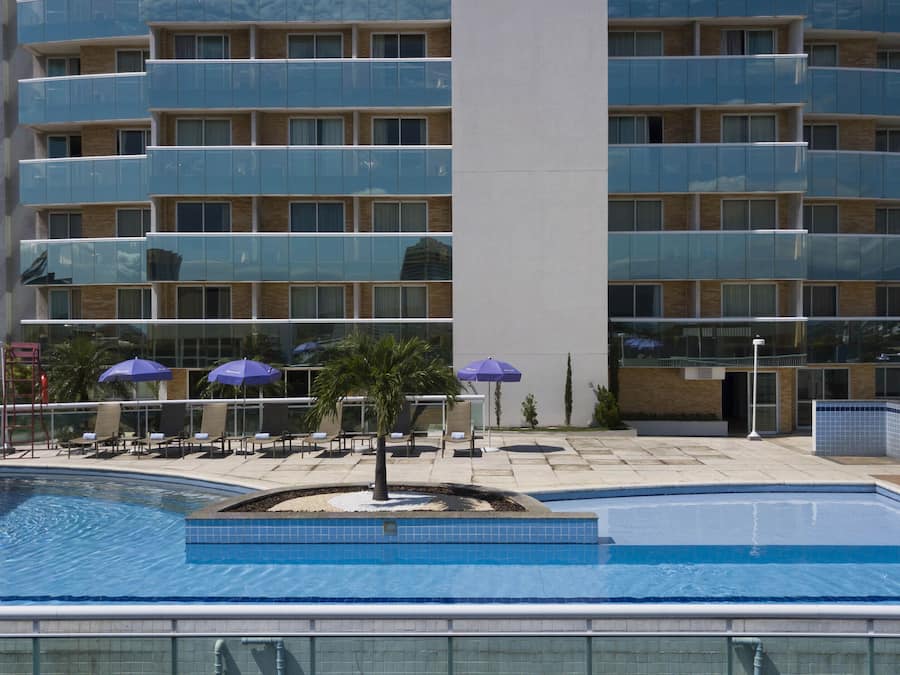 Outdoor pool, open 10:00 AM to 6:00 PM, pool umbrellas, pool loungers